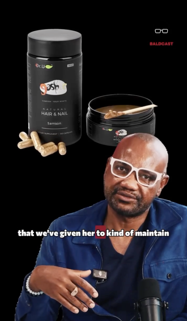 Dr. Sanusi Umar seated beside black hair and nail supplement containers and an open topical product jar.